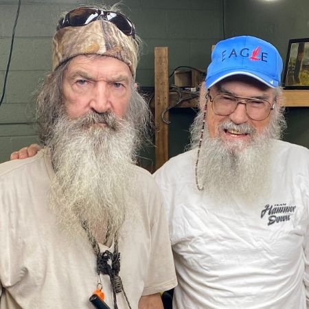 SI Robertson (right) with his brother Phil Robertson (left), a founder of Duck Commander.